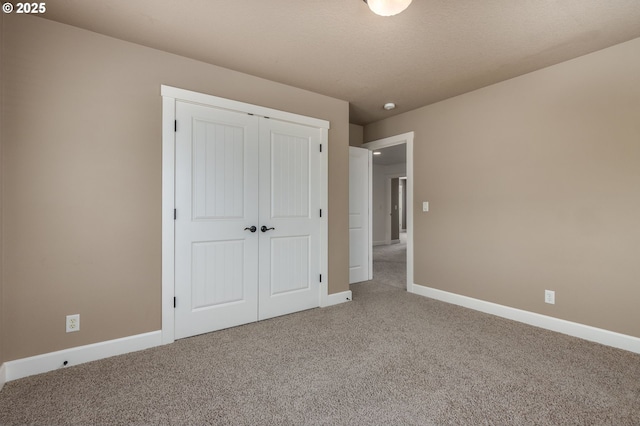 7760 SW Hyland Way, Beaverton, OR 97008 - unfurnished bedroom with carpet flooring, baseboards, and a closet