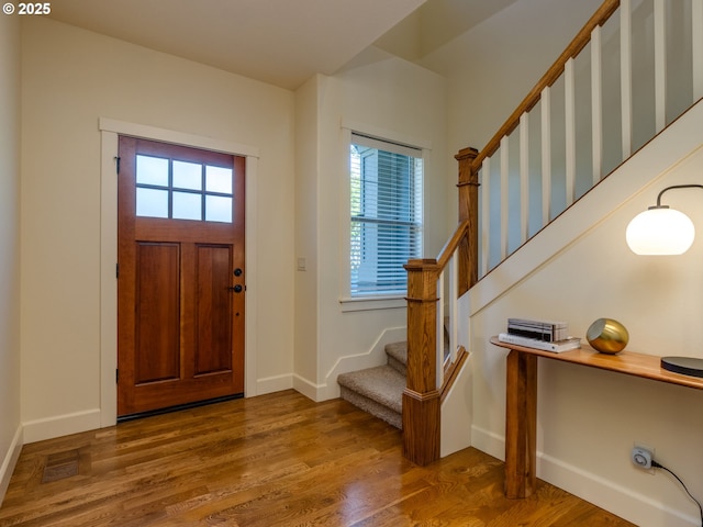 7760 SW Hyland Way, Beaverton, OR 97008 - foyer entrance featuring stairs, baseboards, and wood finished floors