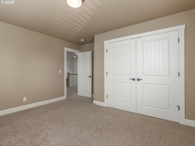 7760 SW Hyland Way, Beaverton, OR 97008 - unfurnished bedroom with carpet, baseboards, and a closet