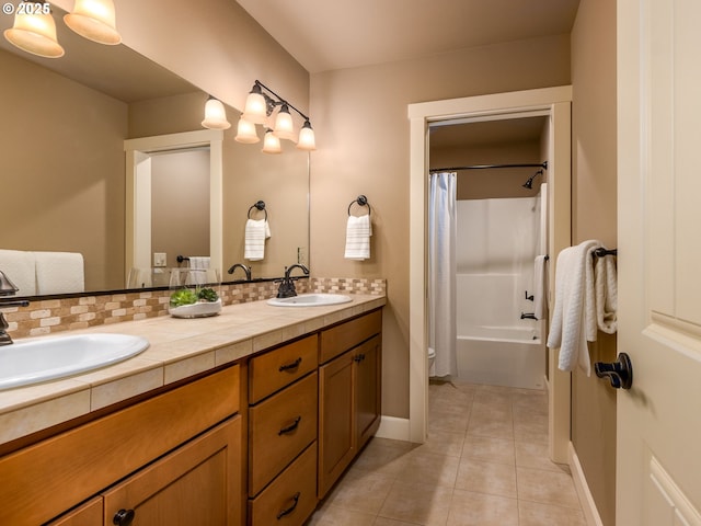 7760 SW Hyland Way, Beaverton, OR 97008 - bathroom featuring tile patterned flooring, double vanity, baseboards, shower / bath combination with curtain, and toilet