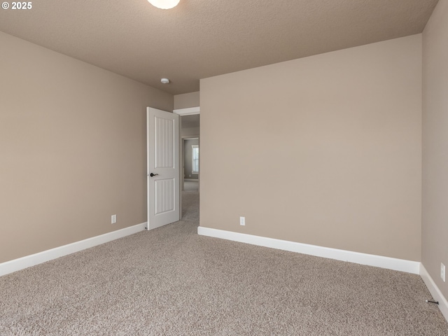 7760 SW Hyland Way, Beaverton, OR 97008 - spare room featuring light carpet and baseboards