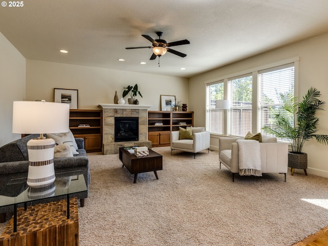 7760 SW Hyland Way, Beaverton, OR 97008 - living area with a ceiling fan, recessed lighting, light carpet, a fireplace, and baseboards
