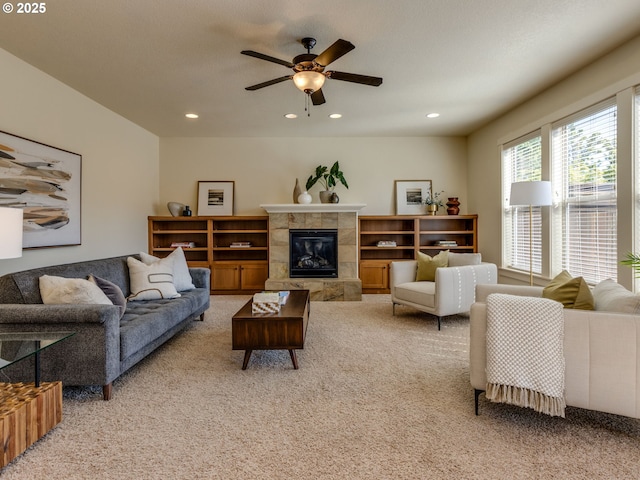 7760 SW Hyland Way, Beaverton, OR 97008 - living area featuring light carpet, ceiling fan, recessed lighting, and a tiled fireplace