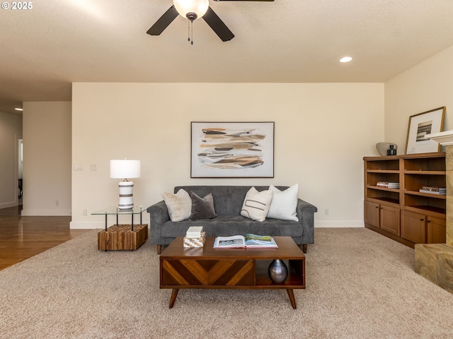 7760 SW Hyland Way, Beaverton, OR 97008 - living room with carpet, a ceiling fan, baseboards, and recessed lighting