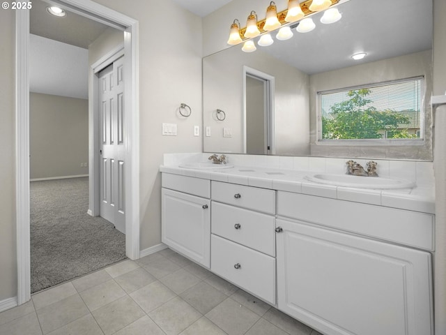 bathroom featuring tile patterned floors and vanity