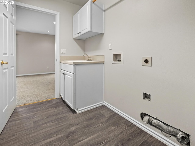 washroom with sink, cabinets, washer hookup, dark hardwood / wood-style flooring, and hookup for an electric dryer