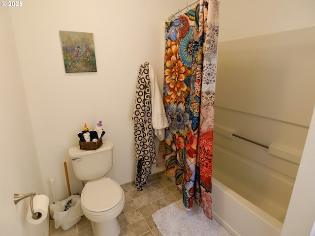 bathroom featuring toilet