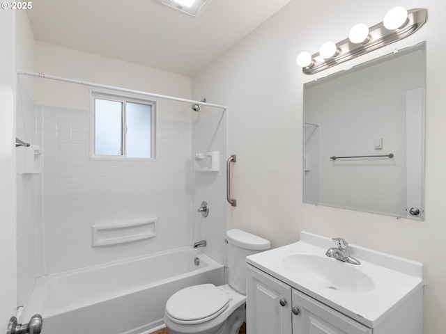 full bathroom with toilet, tiled shower / bath, and vanity