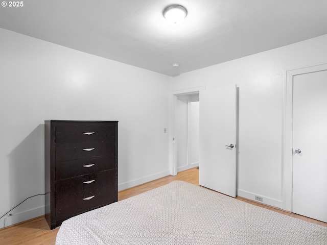 bedroom featuring light wood-type flooring