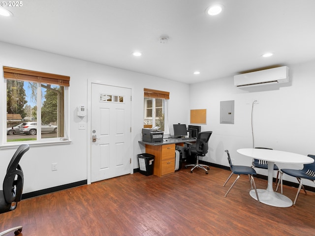 office with electric panel, dark wood-type flooring, and an AC wall unit