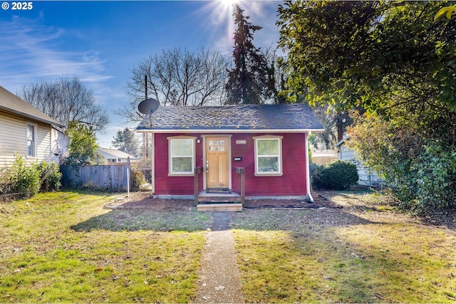 view of outbuilding featuring a yard