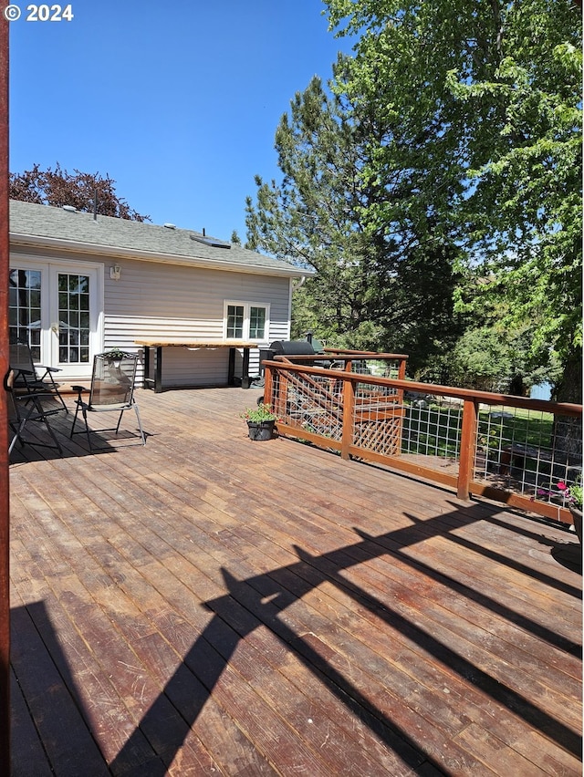 wooden terrace featuring french doors