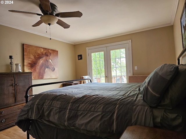 bedroom with access to exterior, light wood-type flooring, and ornamental molding