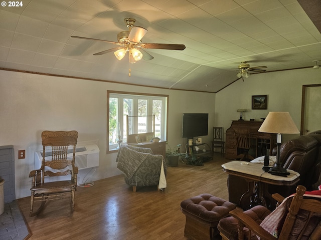 living room with lofted ceiling, a fireplace, wood finished floors, a ceiling fan, and crown molding