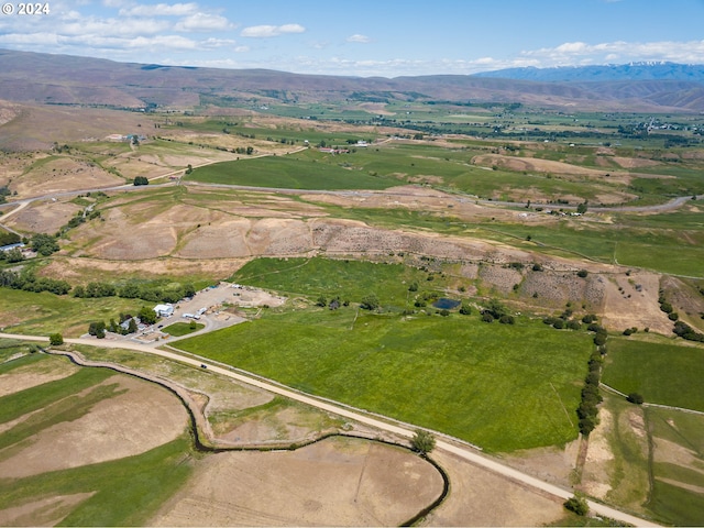 birds eye view of property featuring a rural view and a mountain view