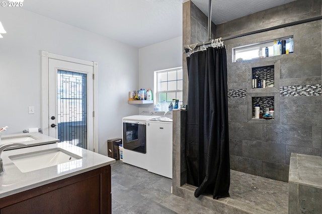 952 S 69th St, Springfield, OR 97478 - kitchen with washer and dryer, light countertops, and dark brown cabinets