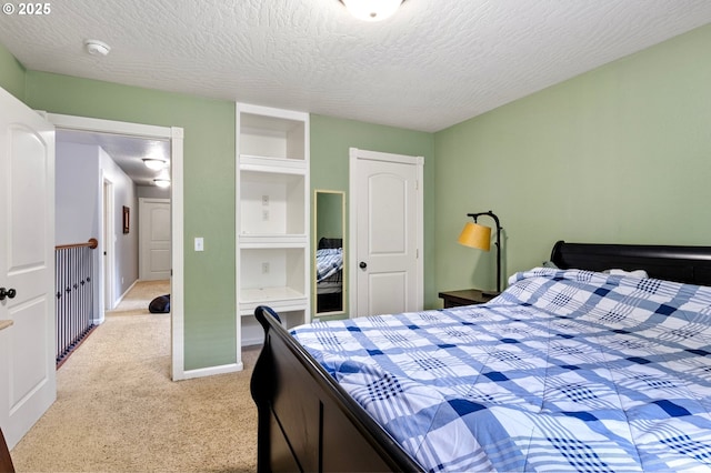 952 S 69th St, Springfield, OR 97478 - bedroom featuring light carpet and a textured ceiling