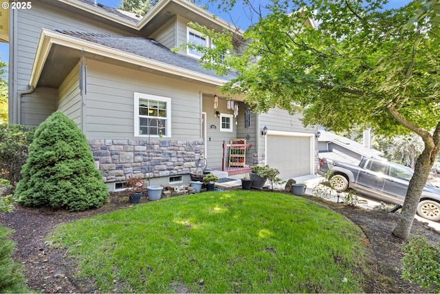 952 S 69th St, Springfield, OR 97478 - view of front of house featuring a front yard, an attached garage, and stone siding