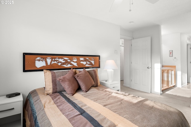 bedroom featuring ceiling fan and light colored carpet