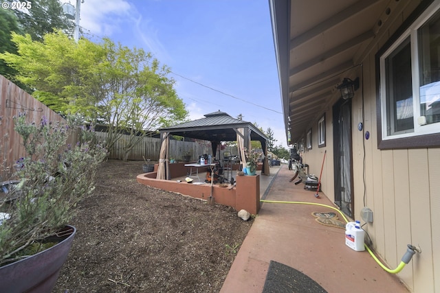 625 Crestview Dr, Reedsport, OR 97467 - fenced backyard featuring a gazebo and a patio area