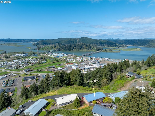 625 Crestview Dr, Reedsport, OR 97467 - aerial view of a water and mountain view and a heavily wooded area