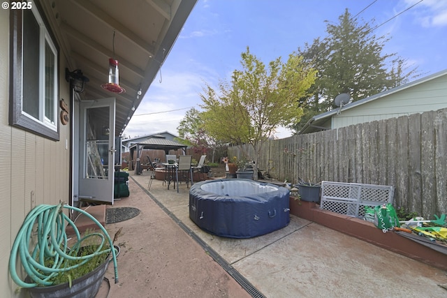 625 Crestview Dr, Reedsport, OR 97467 - fenced backyard featuring a gazebo, a patio, and outdoor dining space