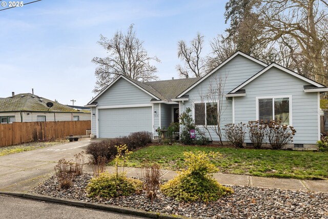 ranch-style home featuring driveway, a garage, fence, and a front lawn