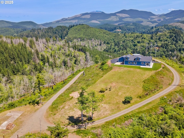 1091 N Echo Mountain Rd, Otis, OR 97368 - view of subject property with a mountainous background and a forest