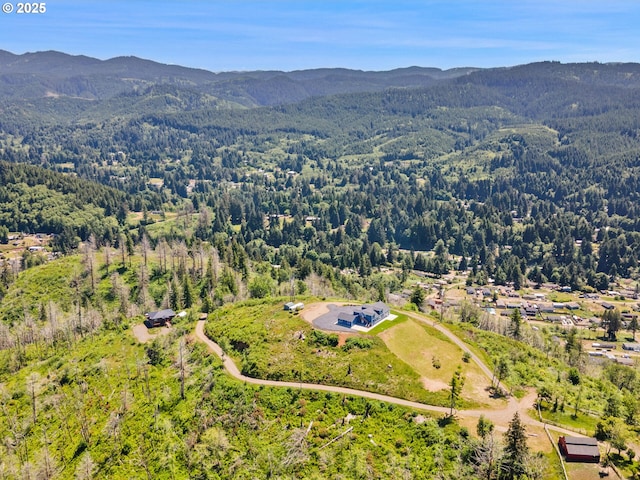 1091 N Echo Mountain Rd, Otis, OR 97368 - bird's eye view of mountains and a heavily wooded area
