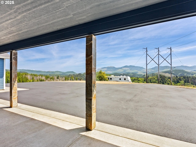 1091 N Echo Mountain Rd, Otis, OR 97368 - view of patio / terrace with a mountain view