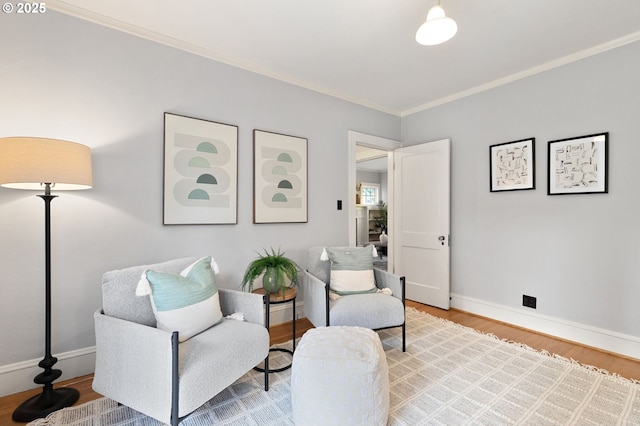 436 SE 44th Ave, Portland, OR 97215 - living area featuring wood finished floors and ornamental molding