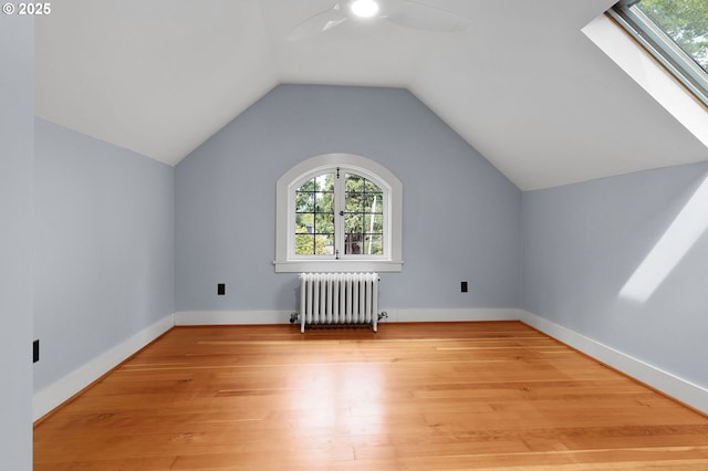 436 SE 44th Ave, Portland, OR 97215 - bonus room with radiator, a ceiling fan, light wood finished floors, and vaulted ceiling