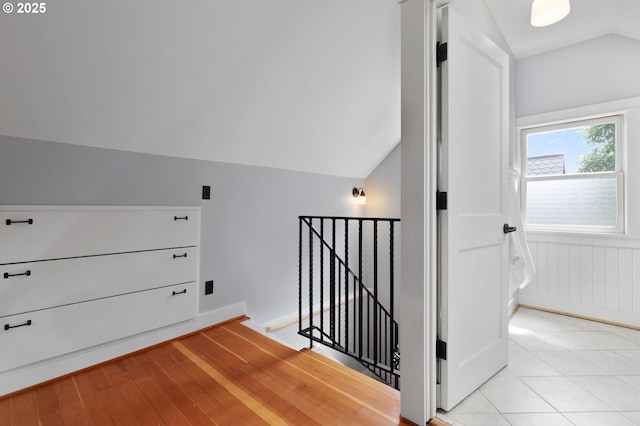 436 SE 44th Ave, Portland, OR 97215 - hall featuring an upstairs landing, vaulted ceiling, and wainscoting