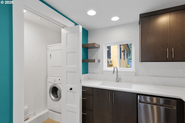 436 SE 44th Ave, Portland, OR 97215 - washroom with stacked washer / dryer and recessed lighting