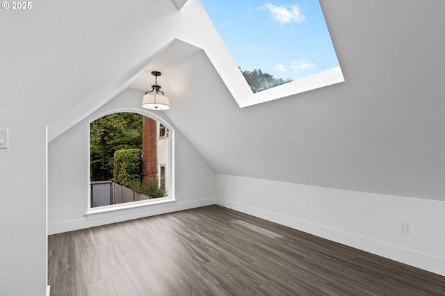436 SE 44th Ave, Portland, OR 97215 - bonus room with dark wood-style flooring, vaulted ceiling, and a skylight