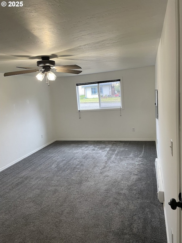 unfurnished room featuring a baseboard heating unit, ceiling fan, a textured ceiling, and dark colored carpet