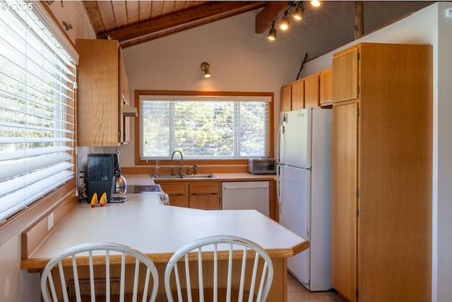 26750 David Ave, Rockaway Beach, OR 97136 - kitchen featuring white appliances, a sink, light countertops, a peninsula, and wood ceiling