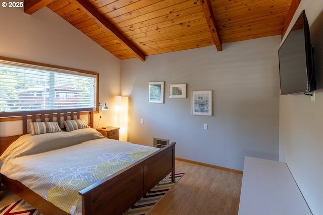 26750 David Ave, Rockaway Beach, OR 97136 - bedroom featuring wood ceiling, light wood-style flooring, and baseboards