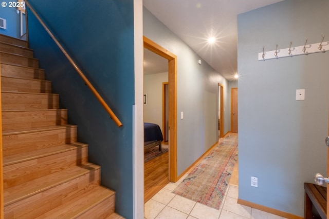 26750 David Ave, Rockaway Beach, OR 97136 - stairs featuring tile patterned floors and baseboards