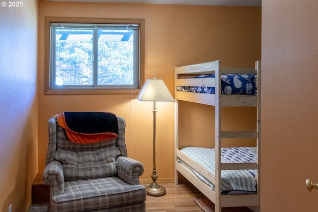 26750 David Ave, Rockaway Beach, OR 97136 - bedroom with wood finished floors and baseboards