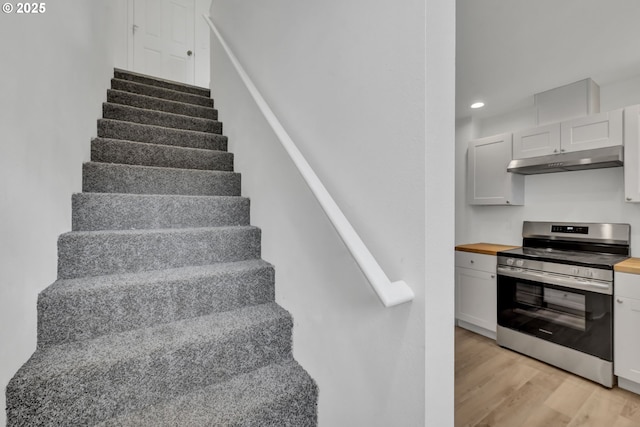 4070 Barger Dr, Eugene, OR 97402 - stairway featuring wood finished floors and recessed lighting