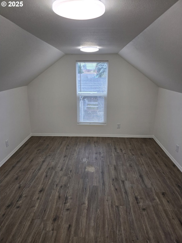 4070 Barger Dr, Eugene, OR 97402 - additional living space with dark wood finished floors and vaulted ceiling
