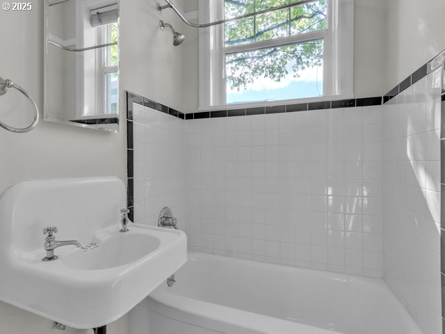 20 NW 16th Ave Unit 8, Portland, OR 97209 - bathroom with a sink and washtub / shower combination