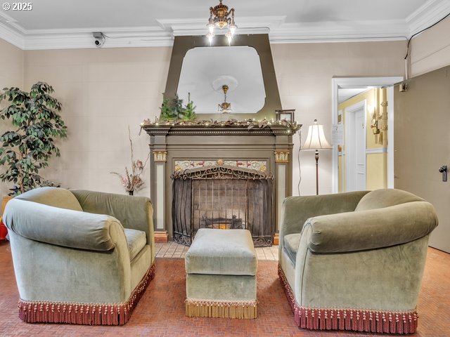 20 NW 16th Ave Unit 8, Portland, OR 97209 - sitting room with ornamental molding and a fireplace with flush hearth