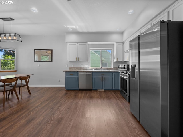 10727 NE Beech St, Portland, OR 97220 - kitchen with appliances with stainless steel finishes, healthy amount of natural light, white cabinets, and recessed lighting