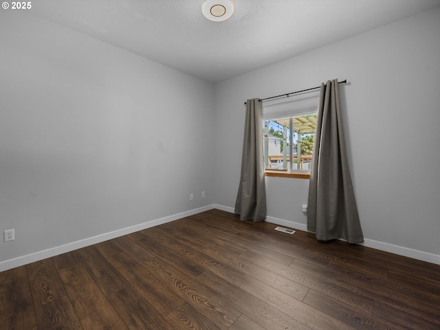 10727 NE Beech St, Portland, OR 97220 - empty room with dark wood-style flooring