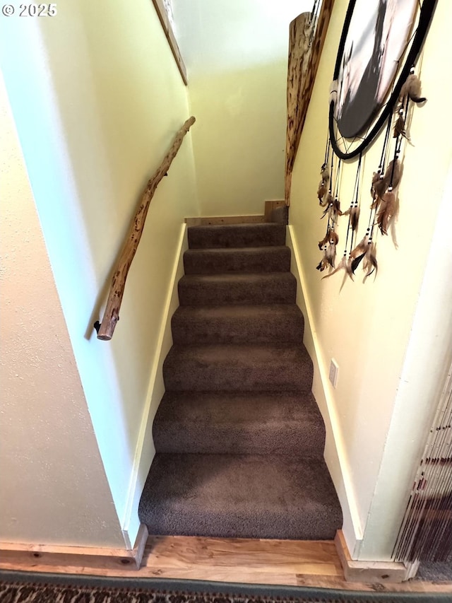87 Adams Loop Rd, Goldendale, WA 98620 - stairway featuring baseboards and wood finished floors
