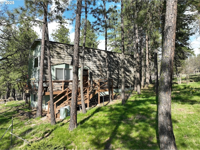 87 Adams Loop Rd, Goldendale, WA 98620 - exterior space with a lawn, a wooden deck, and stairway