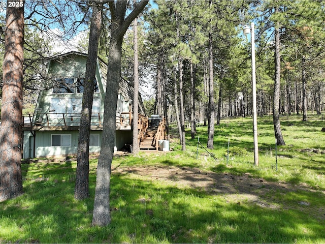87 Adams Loop Rd, Goldendale, WA 98620 - view of yard featuring a wooden deck and stairs