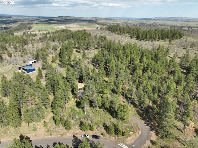 87 Adams Loop Rd, Goldendale, WA 98620 - birds eye view of property featuring a forest view
